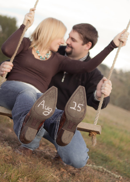 country swing engagment date portrait couple cowboy boots